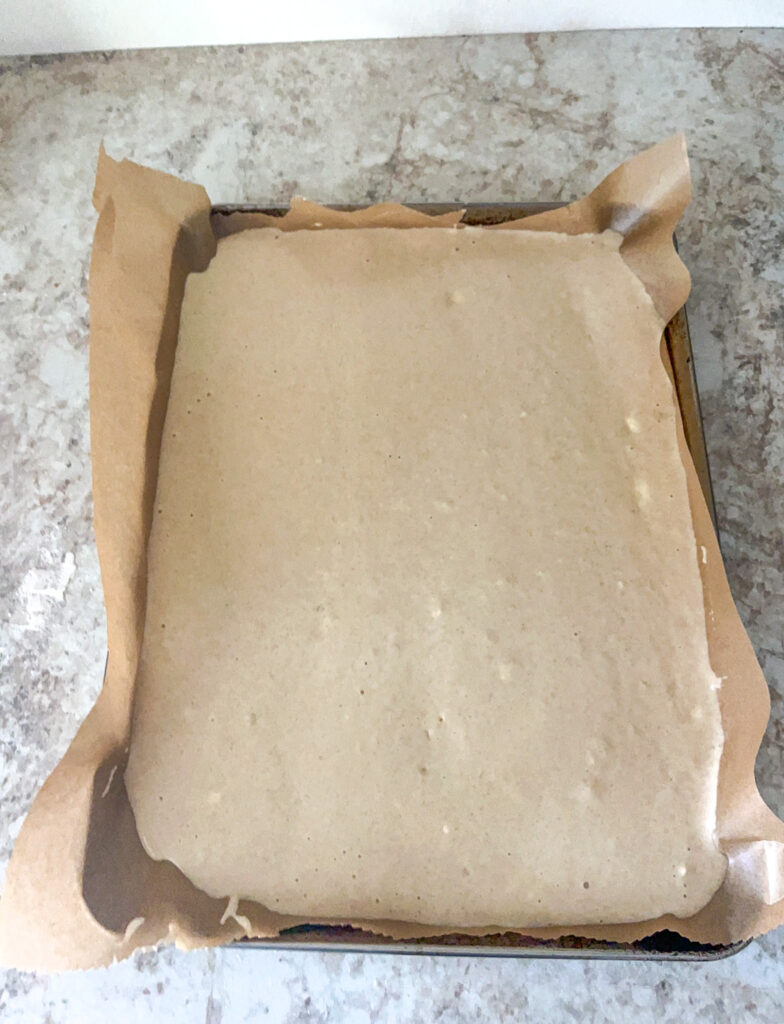 baking sheet pancake batter in a pan